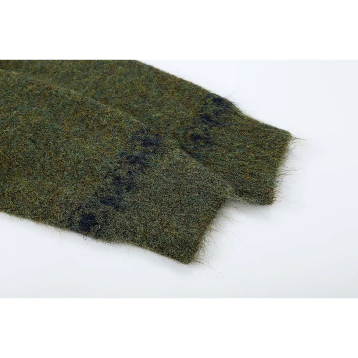 Close-up of ribbed cuff on fuzzy knit sleeve