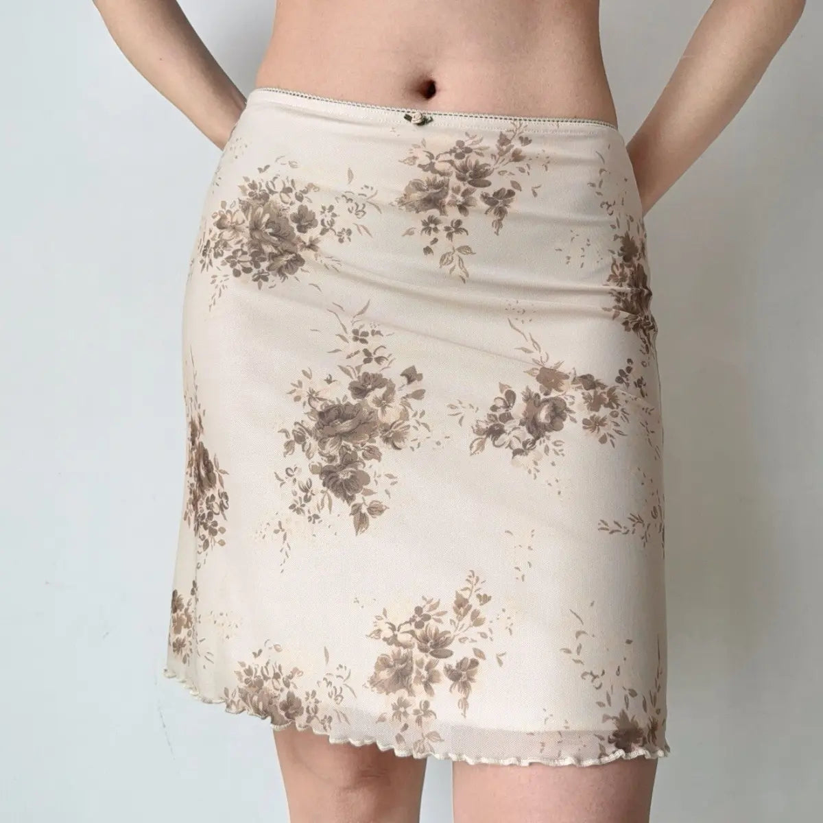 Beige floral print mesh midi skirt with ruffled hem