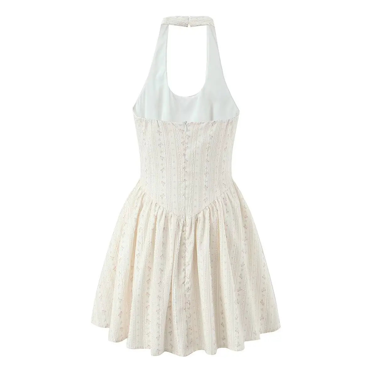 Beige halter-neck eyelet mini dress, back view on white background