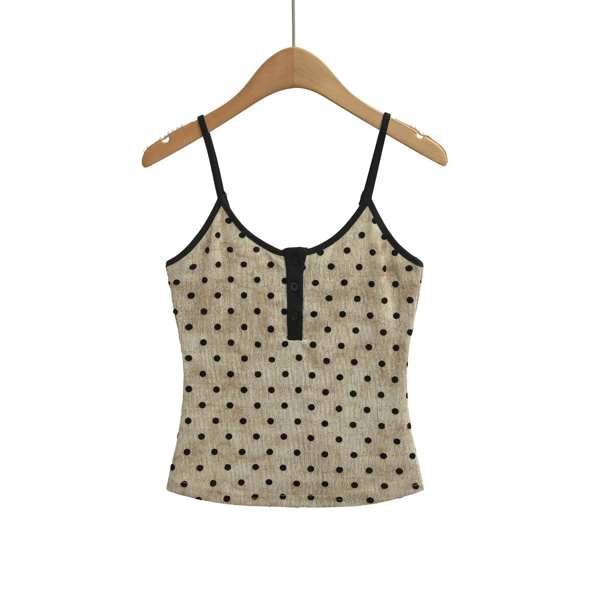 Front view of beige polka dot Henley cami tank top with black trim