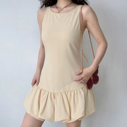 Beige sleeveless mini dress with gathered bubble hem