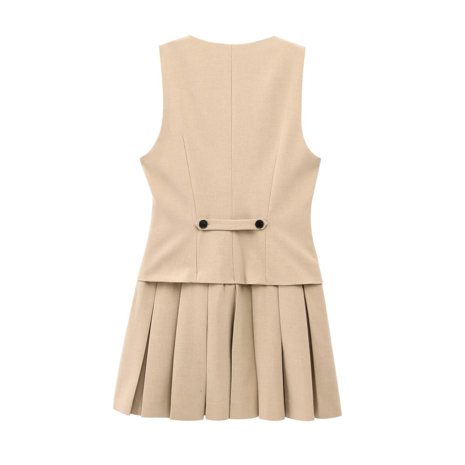 Back view of beige sleeveless vest-style mini dress with waist strap detail and pleated hem
