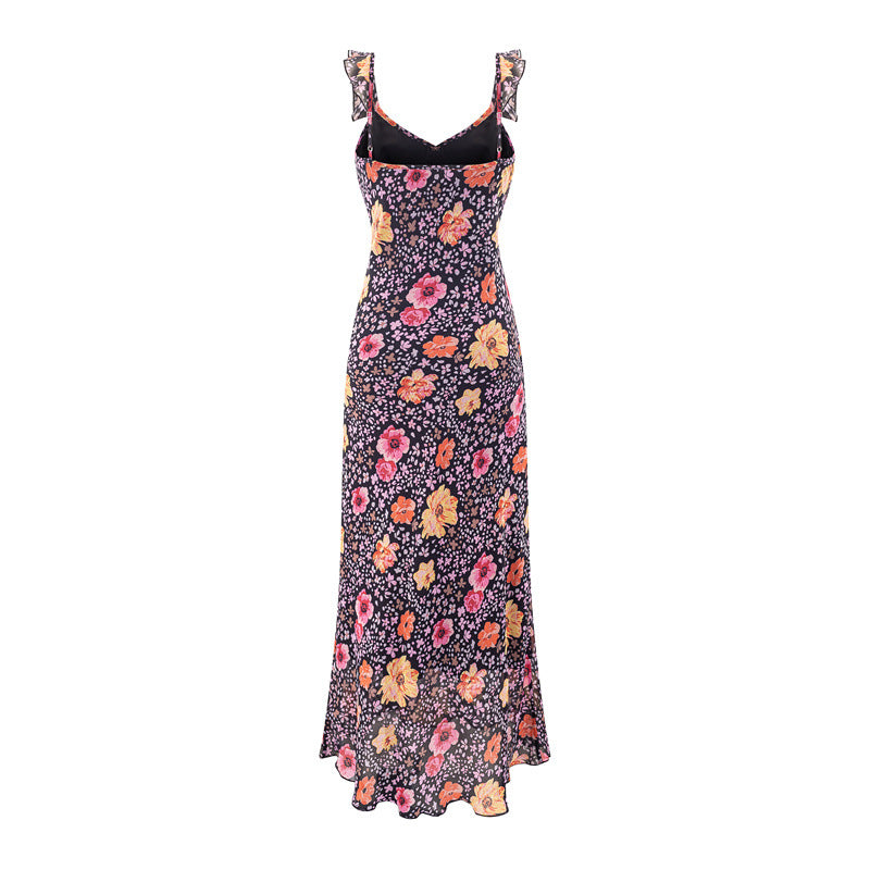 Back view of black floral cami maxi dress with inner lining and ruffled straps