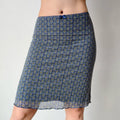 Side view of blue floral mesh midi skirt