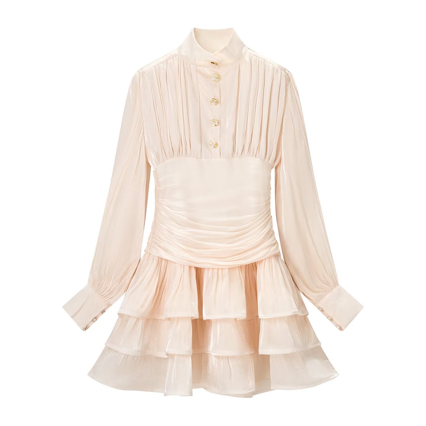 Studio shot of blush pink tiered mini dress, showing its full silhouette: collared neckline, gold buttons, sheer balloon sleeves, ruched waistband, and multi-layer ruffle hem