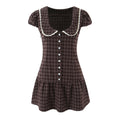 Front flat view brown plaid puff sleeve mini dress with lace collar and button front, vintage-inspired women's dress