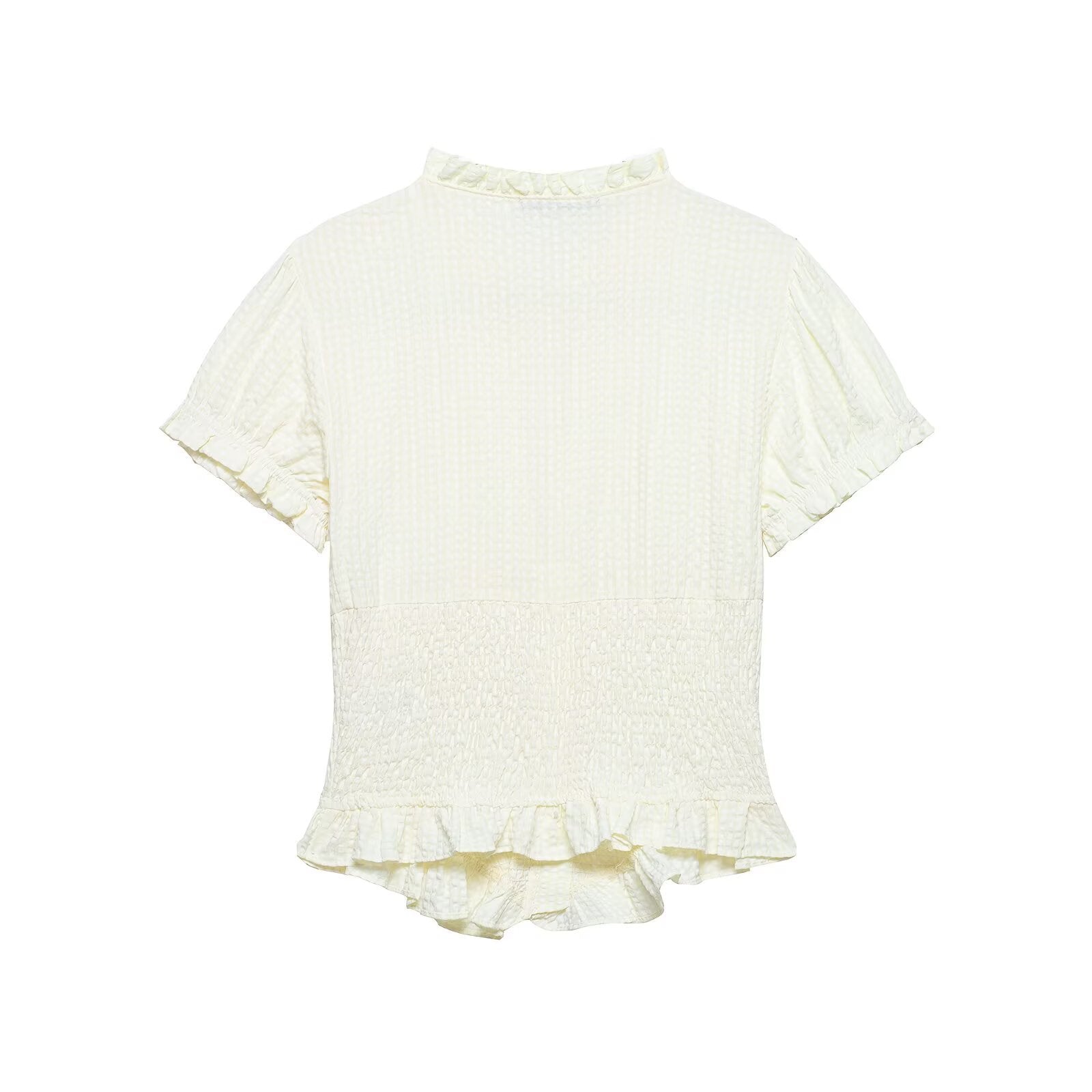 Back view of cream smocked blouse, puff sleeves