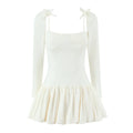 Cream-white long-sleeve dress with square neckline, full front view on plain white background