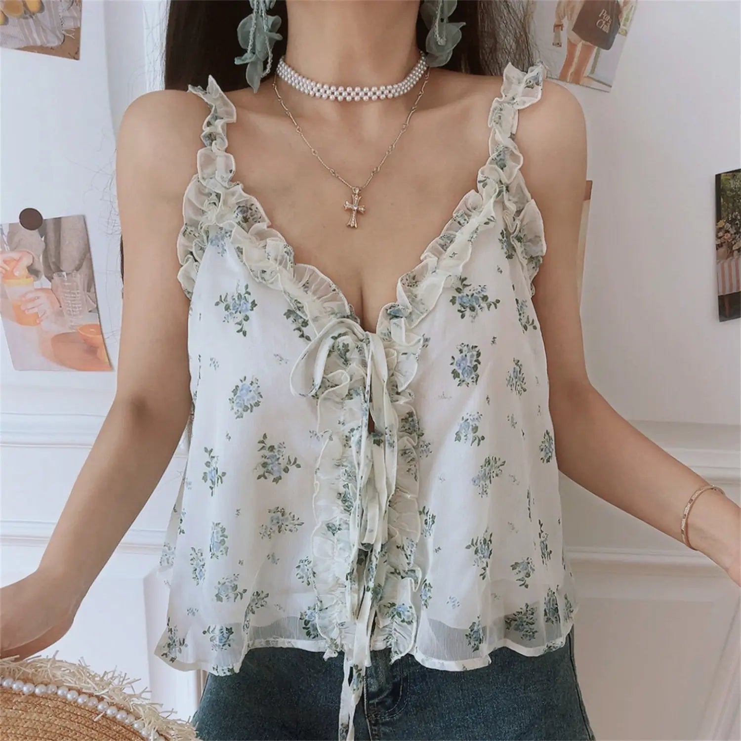  Slightly side front shot of frill strap floral cami, adjustable elastic shoulder straps, loose flowy waist cut match denim shorts