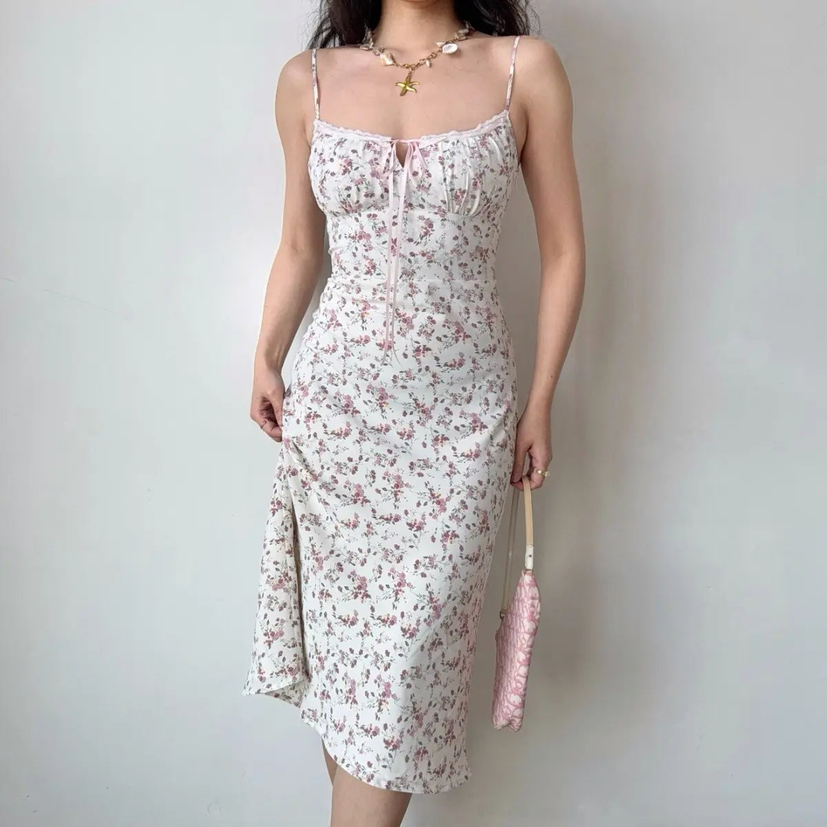 Close-up view of ditsy floral midi dress