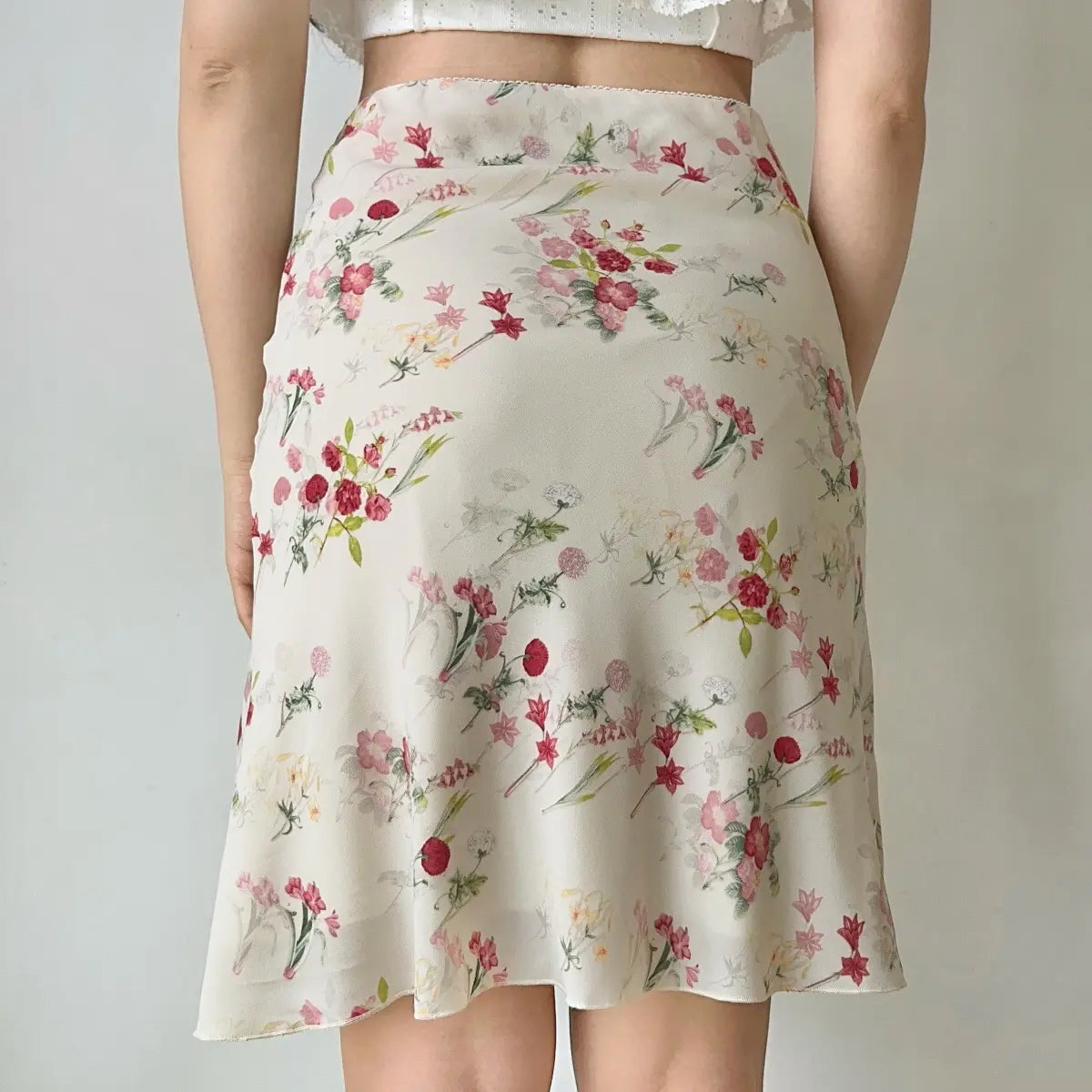 Back view of cream pink floral midi skirt