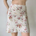 Full front view of cream floral midi skirt