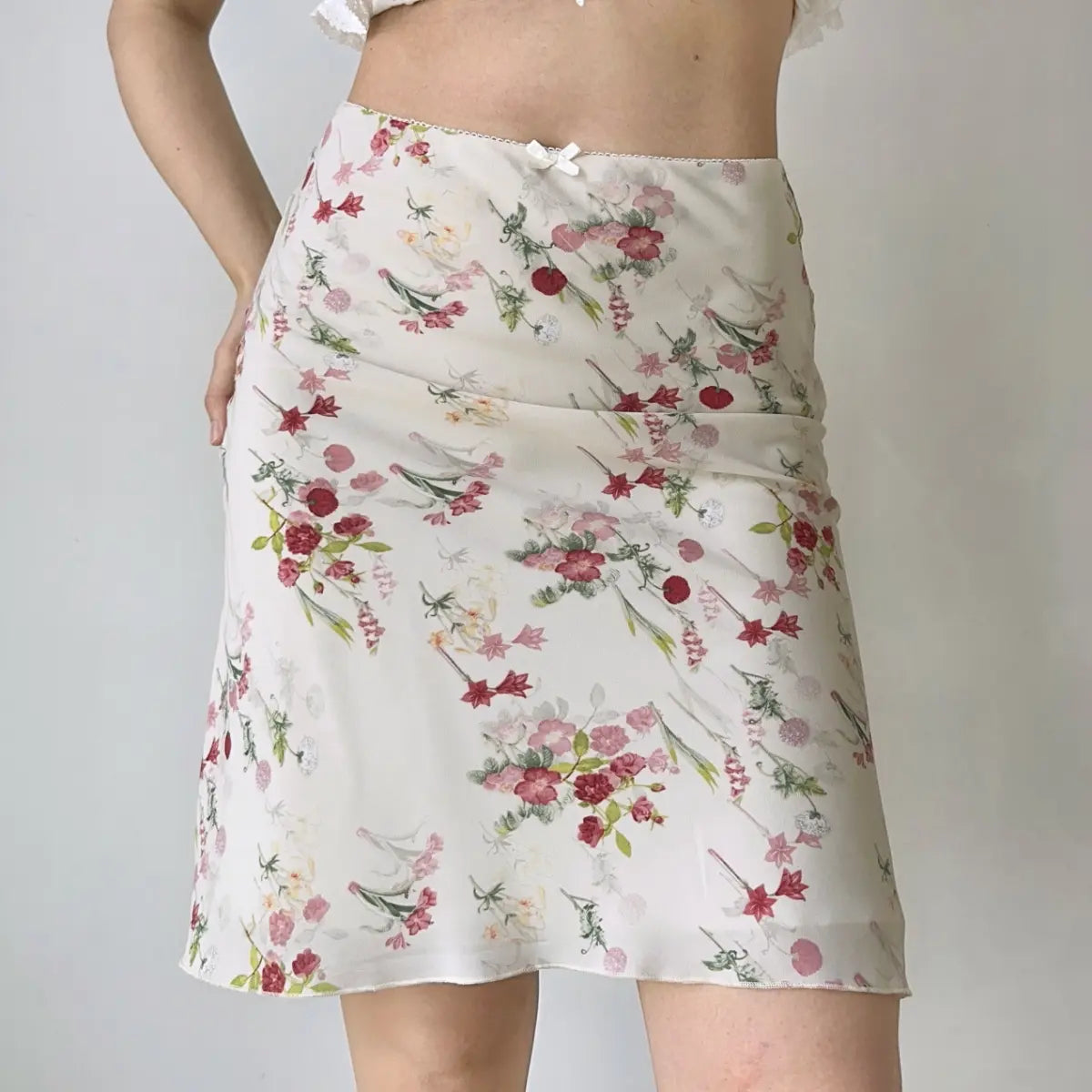 Full front view of cream floral midi skirt