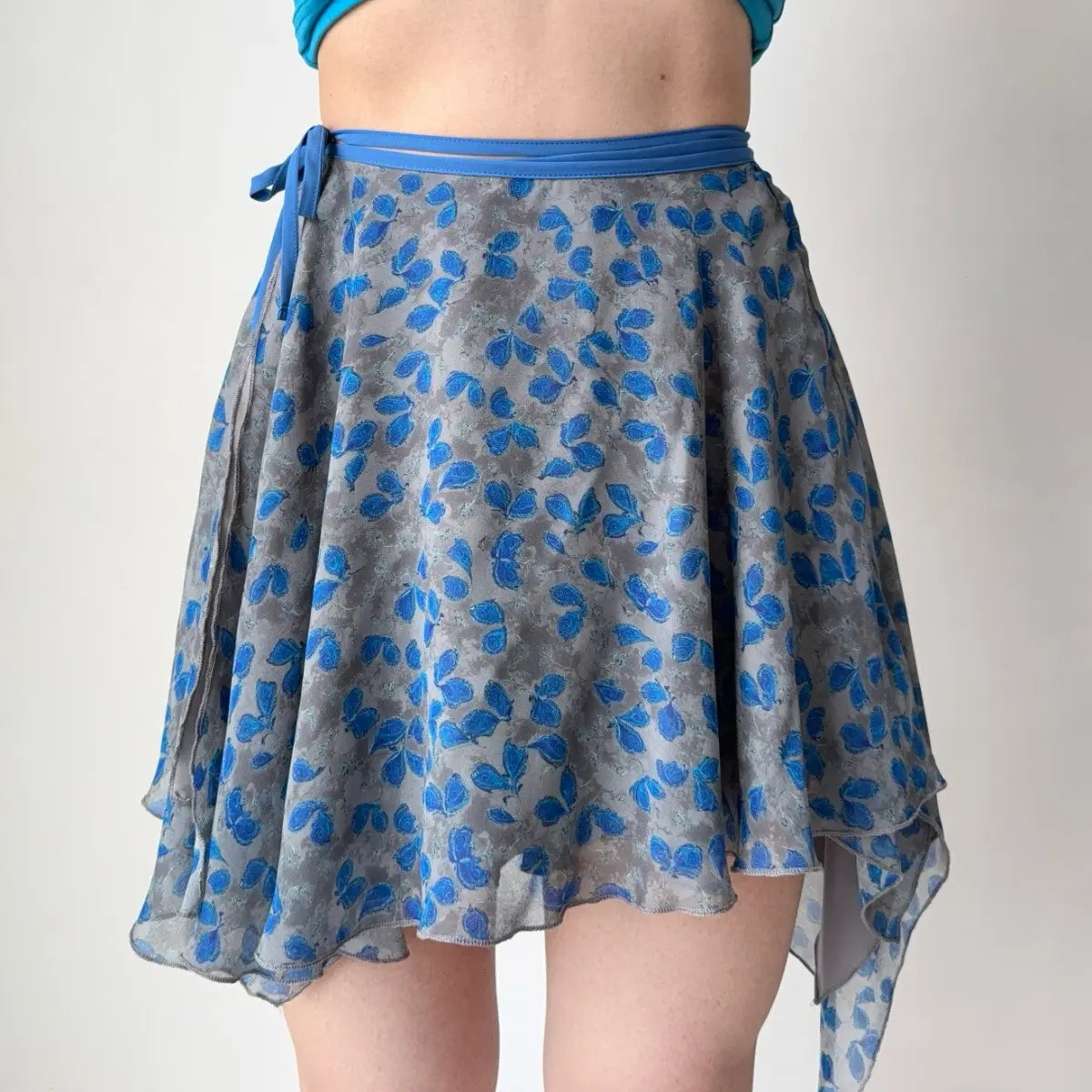 Close-up view of floral wrap skirt