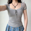 Selfie view of grey mesh ruched top
