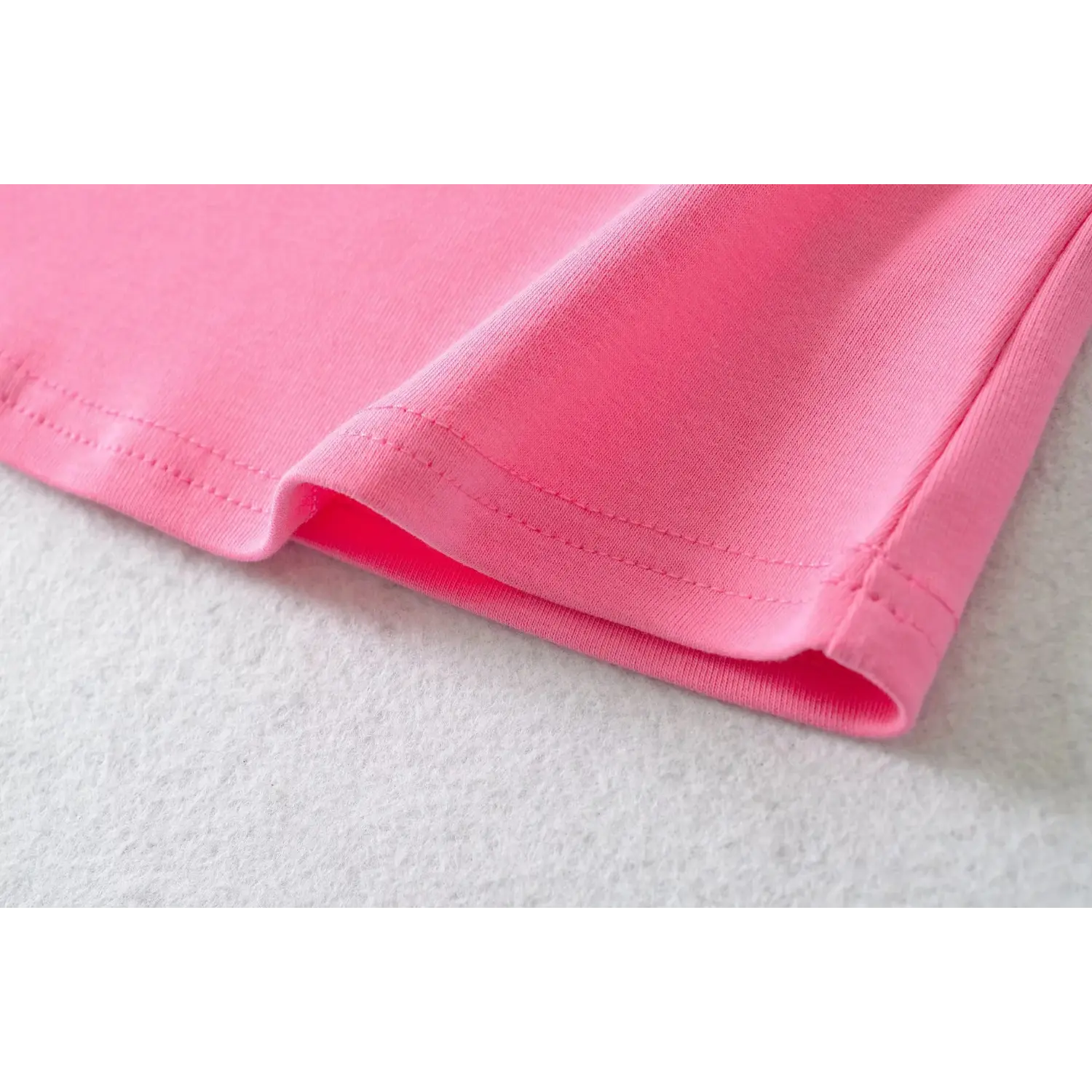 Short sleeve cuff neat stitching detail of hot pink stretch ribbed basic t-shirt