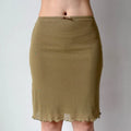 Model in khaki mesh midi skirt, front view