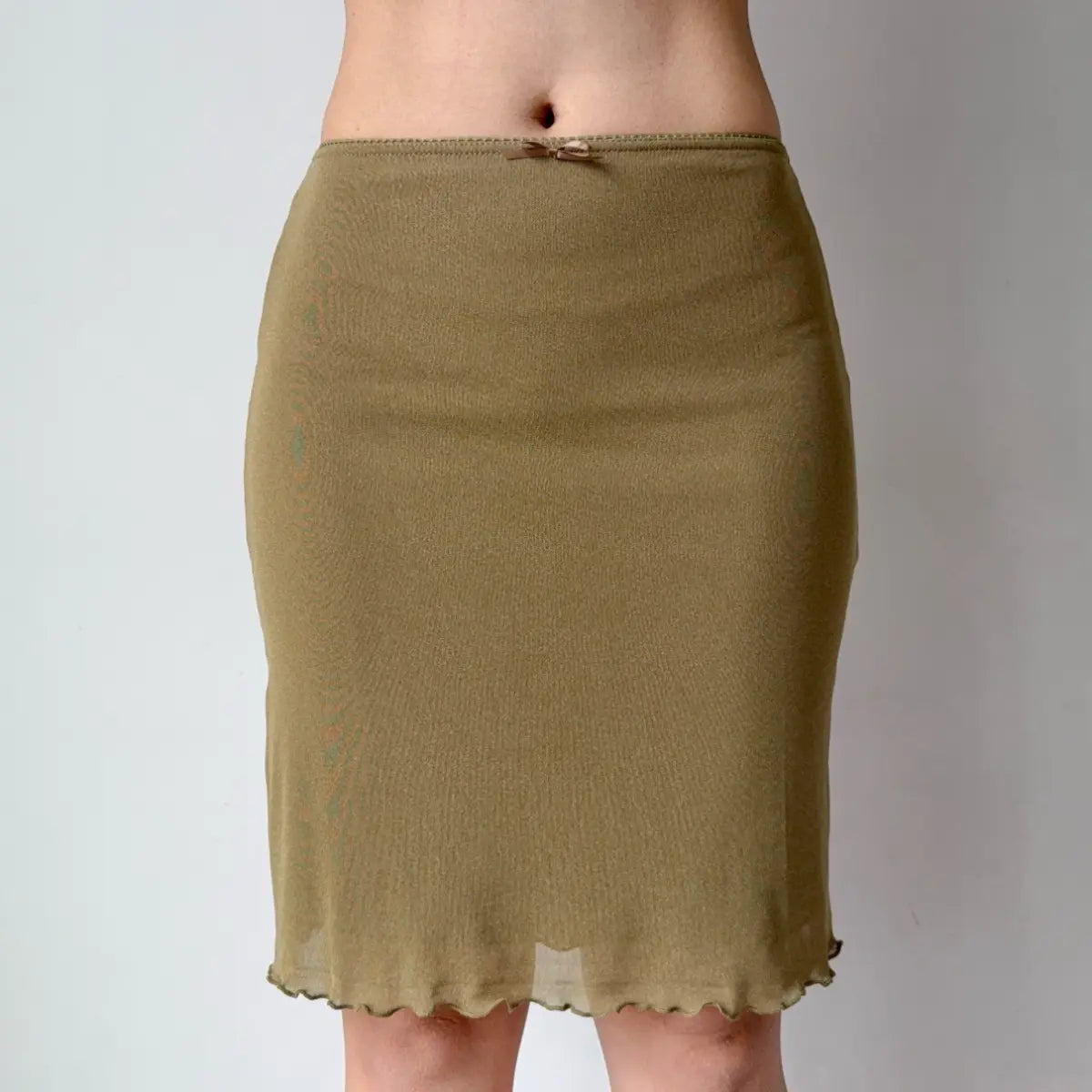 Model in khaki mesh midi skirt, front view