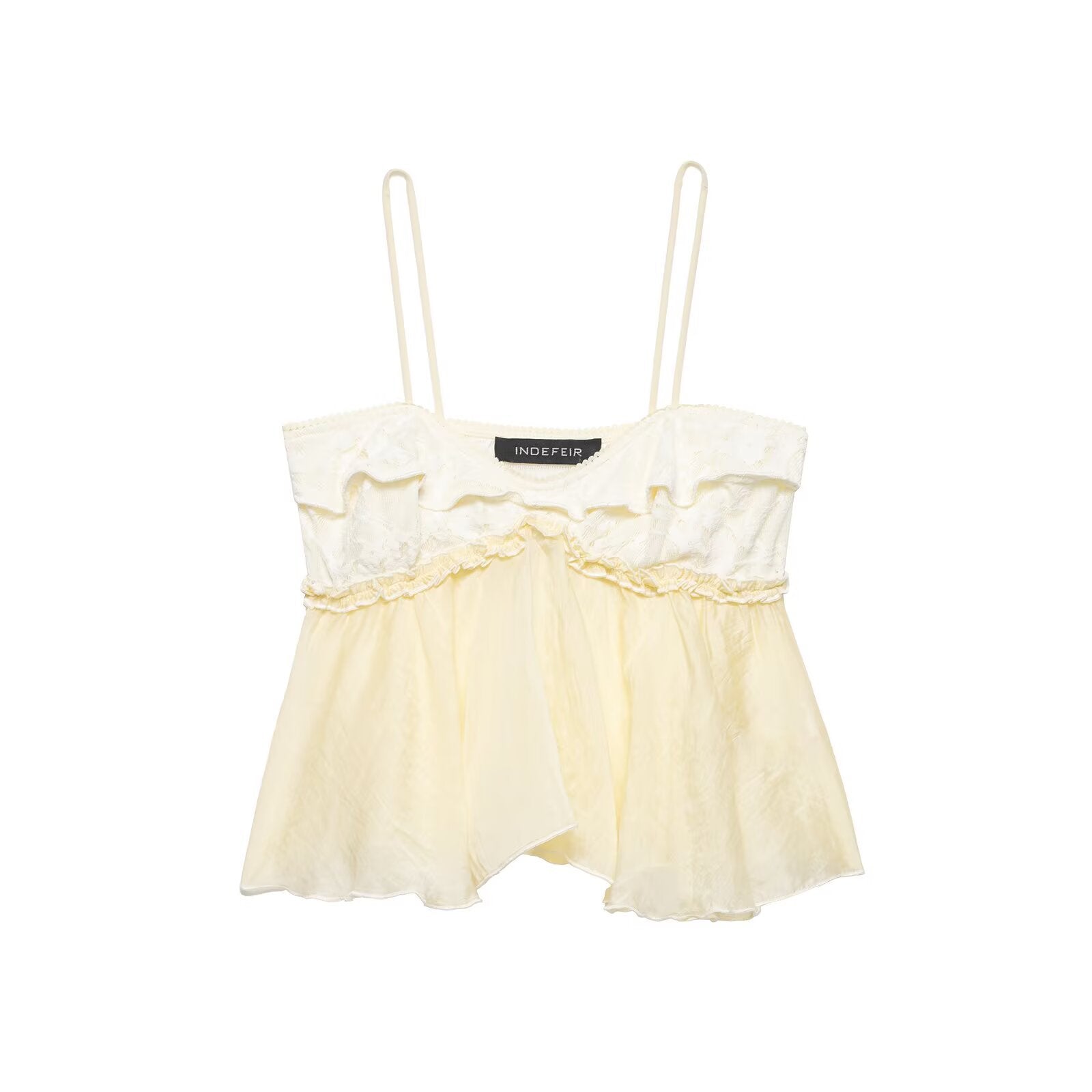 Hanger view of cream lace cami tank showing the ruffled lace bust, layered chiffon hem, and delicate spaghetti straps