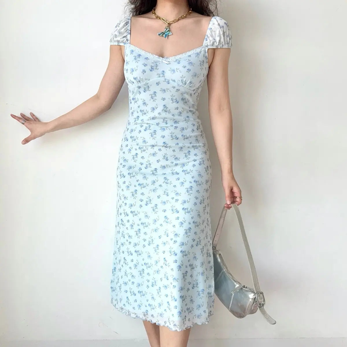 Light blue floral midi dress, front view