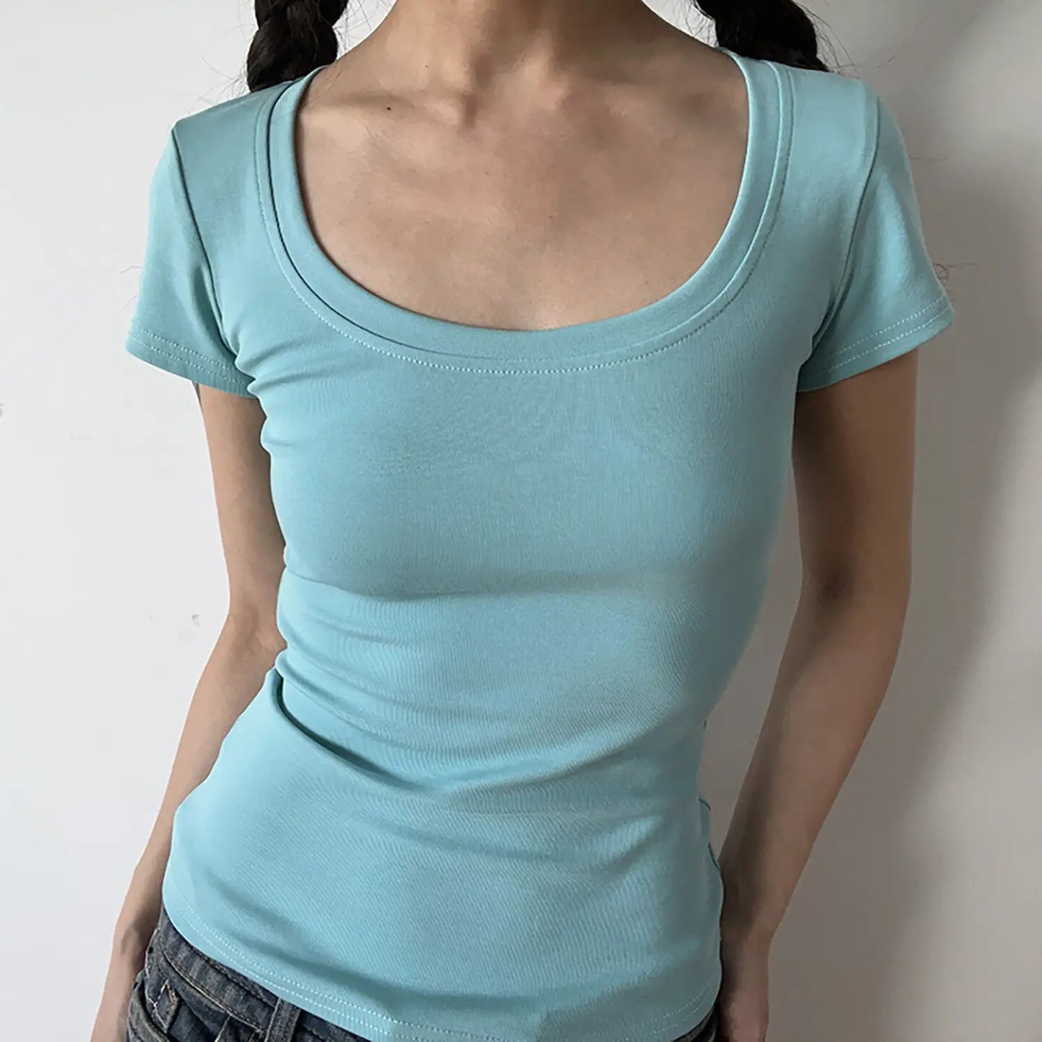 Front shot of sky blue low U-neck stretch ribbed fitted tee, casual slim basic top