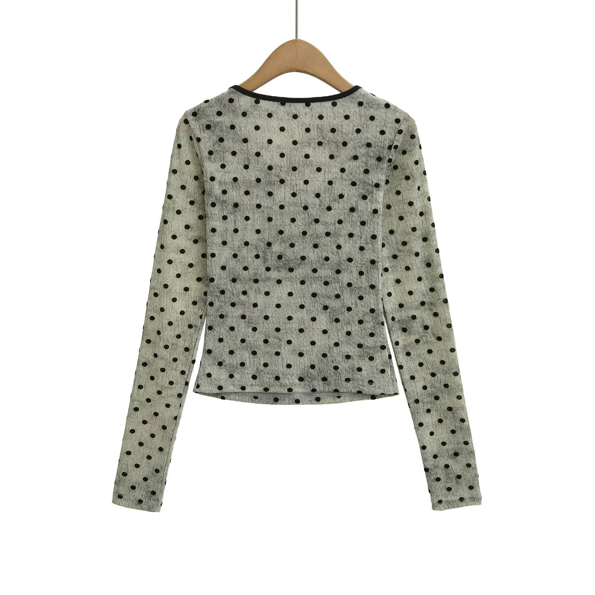 Back view of light gray polka dot Henley long sleeve top