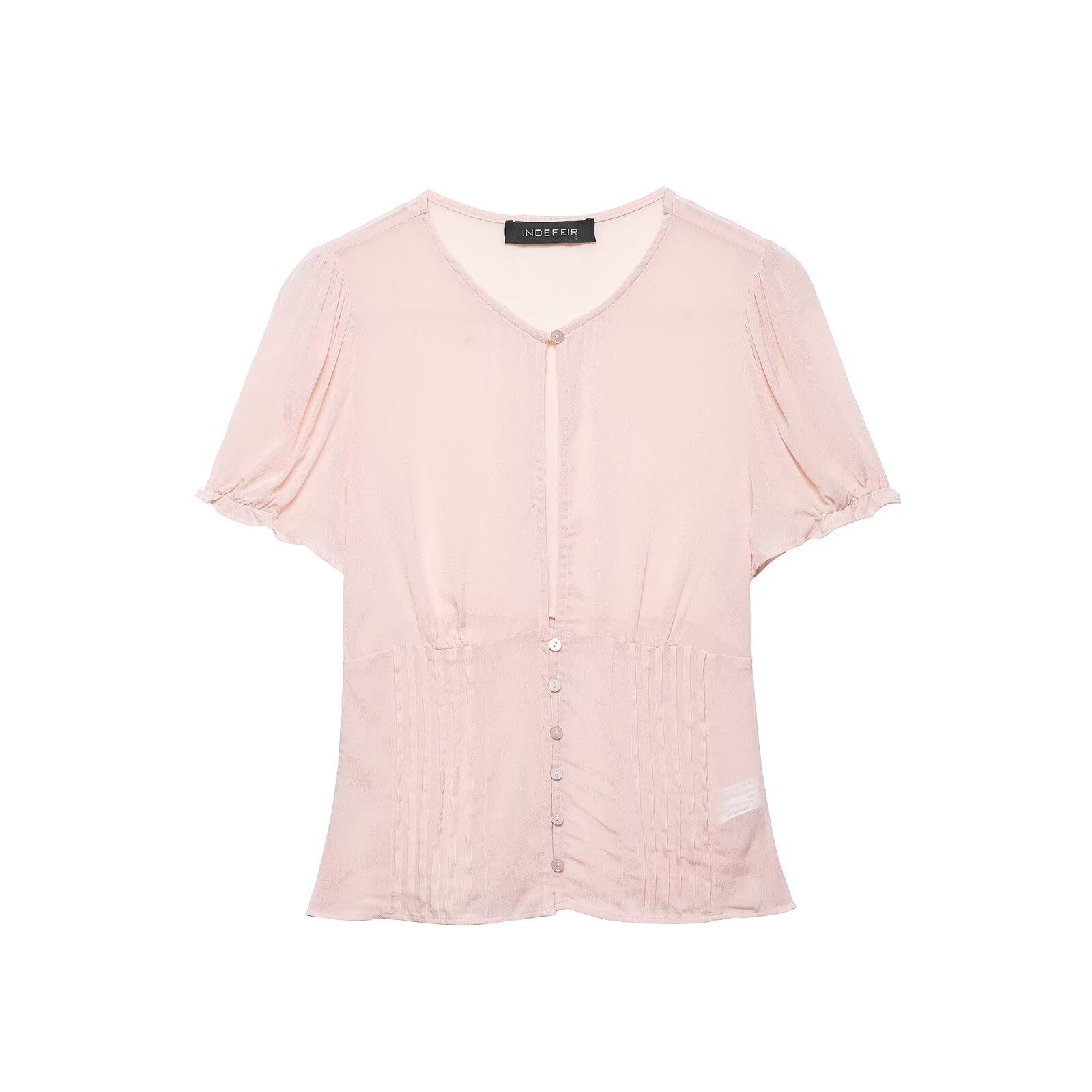 Front view of light pink puff-sleeve blouse with button-down front, keyhole cutout and smocked waist panels