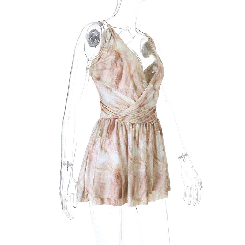 Side view on mannequin of beige marble tie dye print sleeveless deep v neck high waist flared hem mini dress, elegant casual party dress