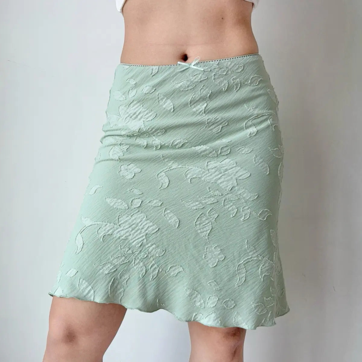 Mint green floral jacquard midi skirt with ruffled hem
