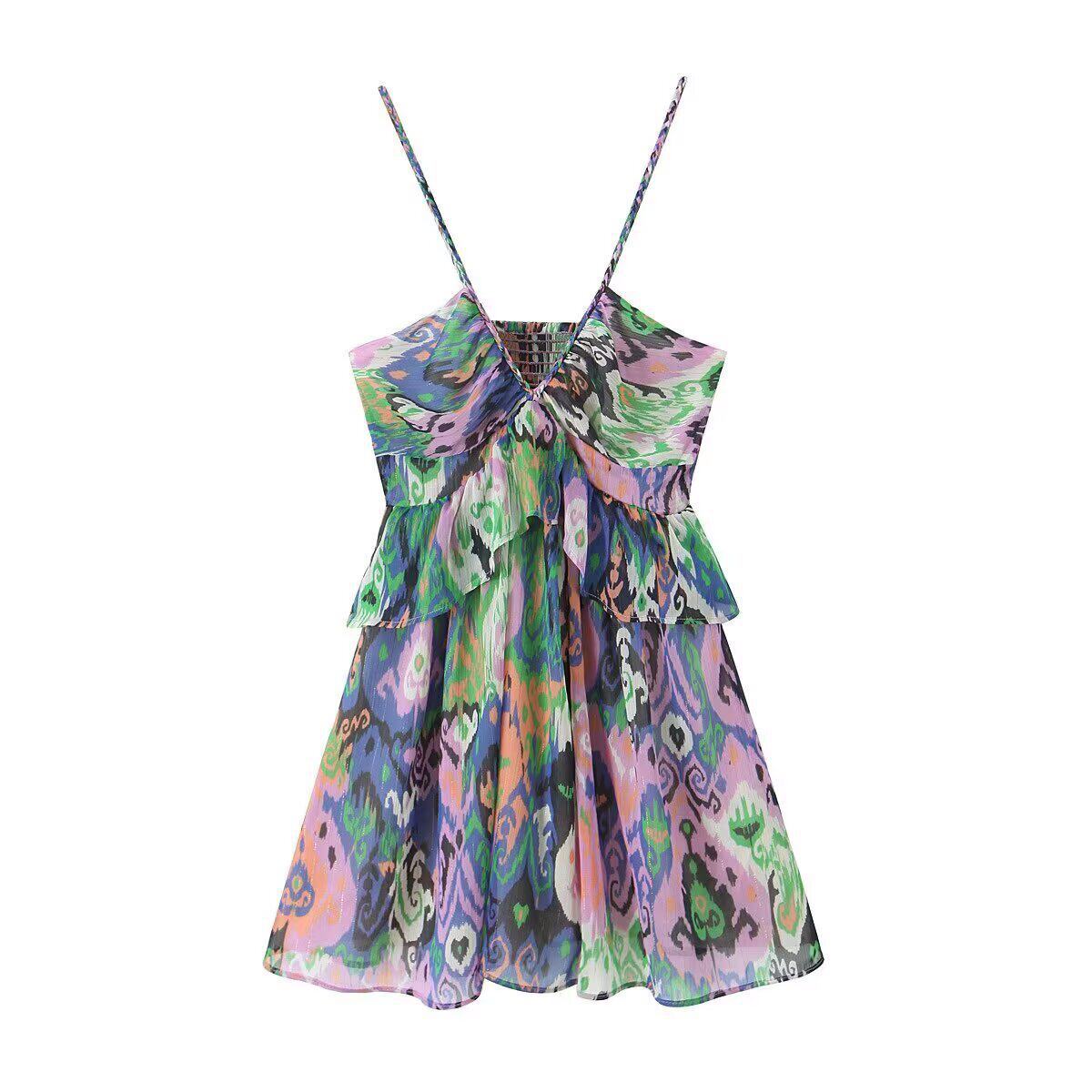Front view of multicolor paisley print cami mini dress with tiered ruffled skirt and spaghetti straps