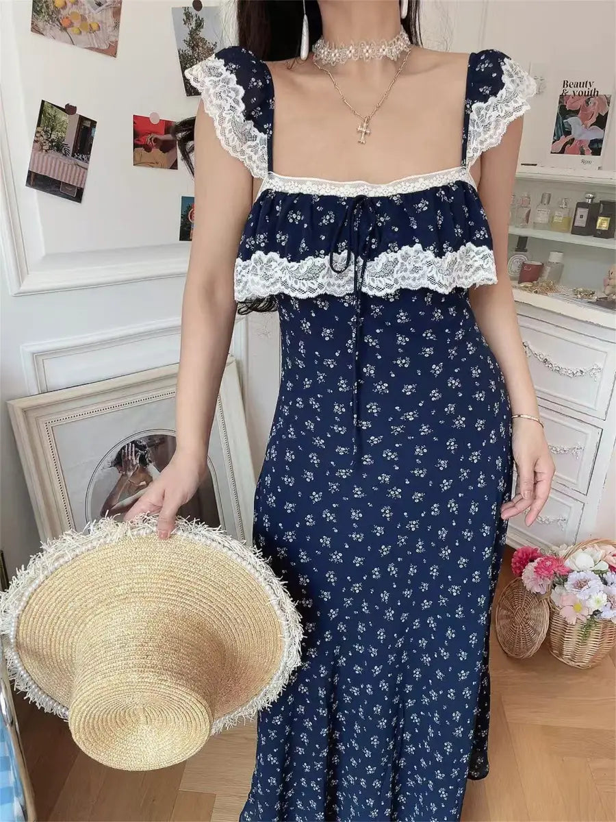 Close-up of navy ditsy floral lace-trim maxi dress on model