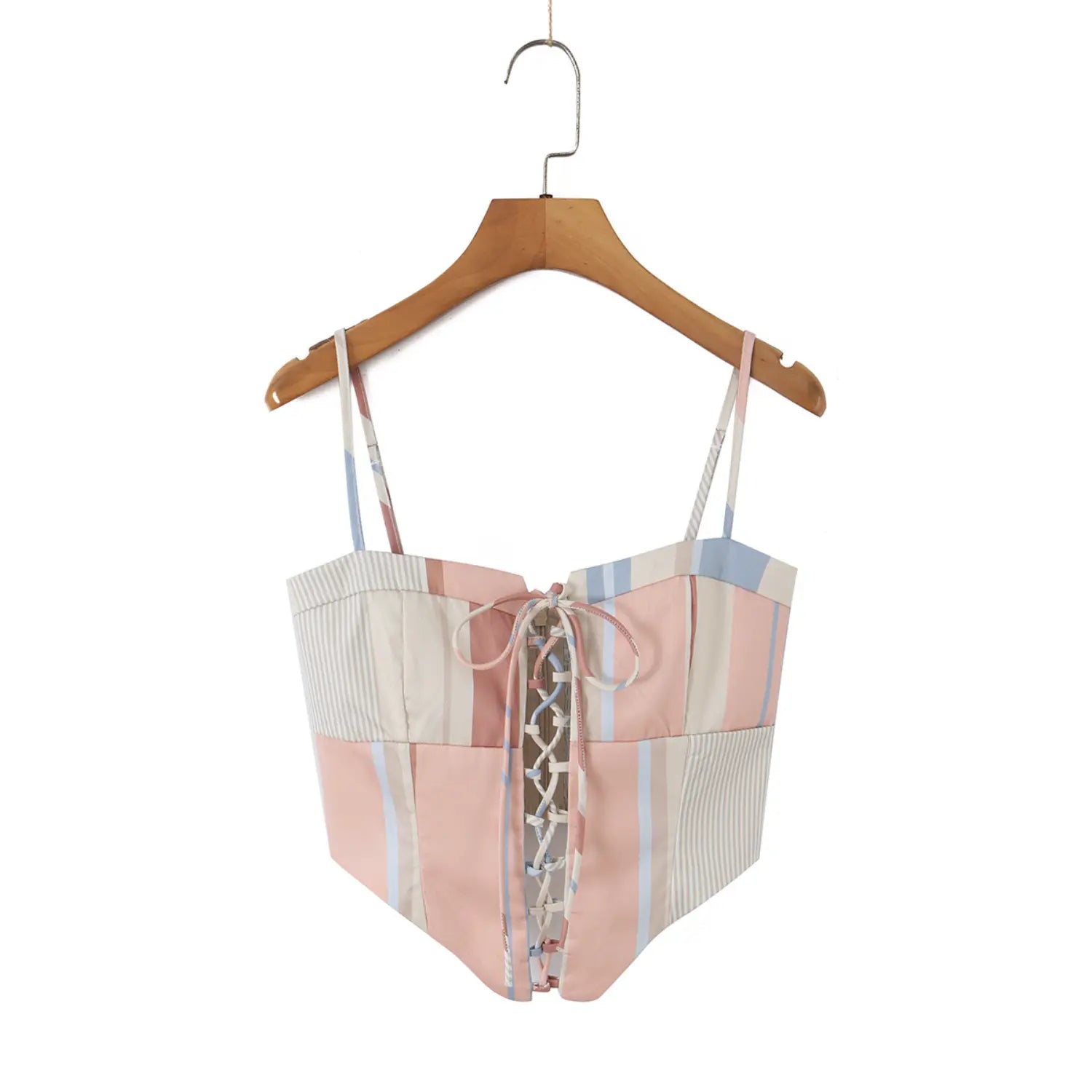 Real hanging front shot of neutral tone lace-up corset cami on wooden hanger, full front tie corset pointed hem silhouette