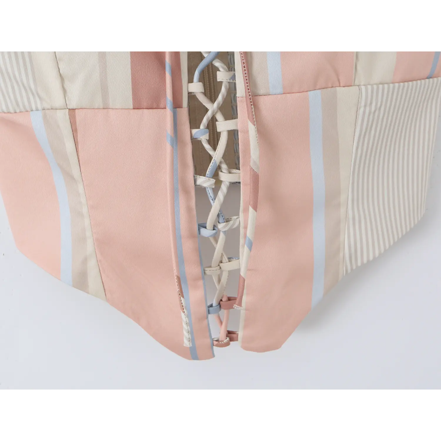 Pointed jagged hem full ribbon lace-up hollow-out craft, layered fabric edge stitching, separate cropped top design