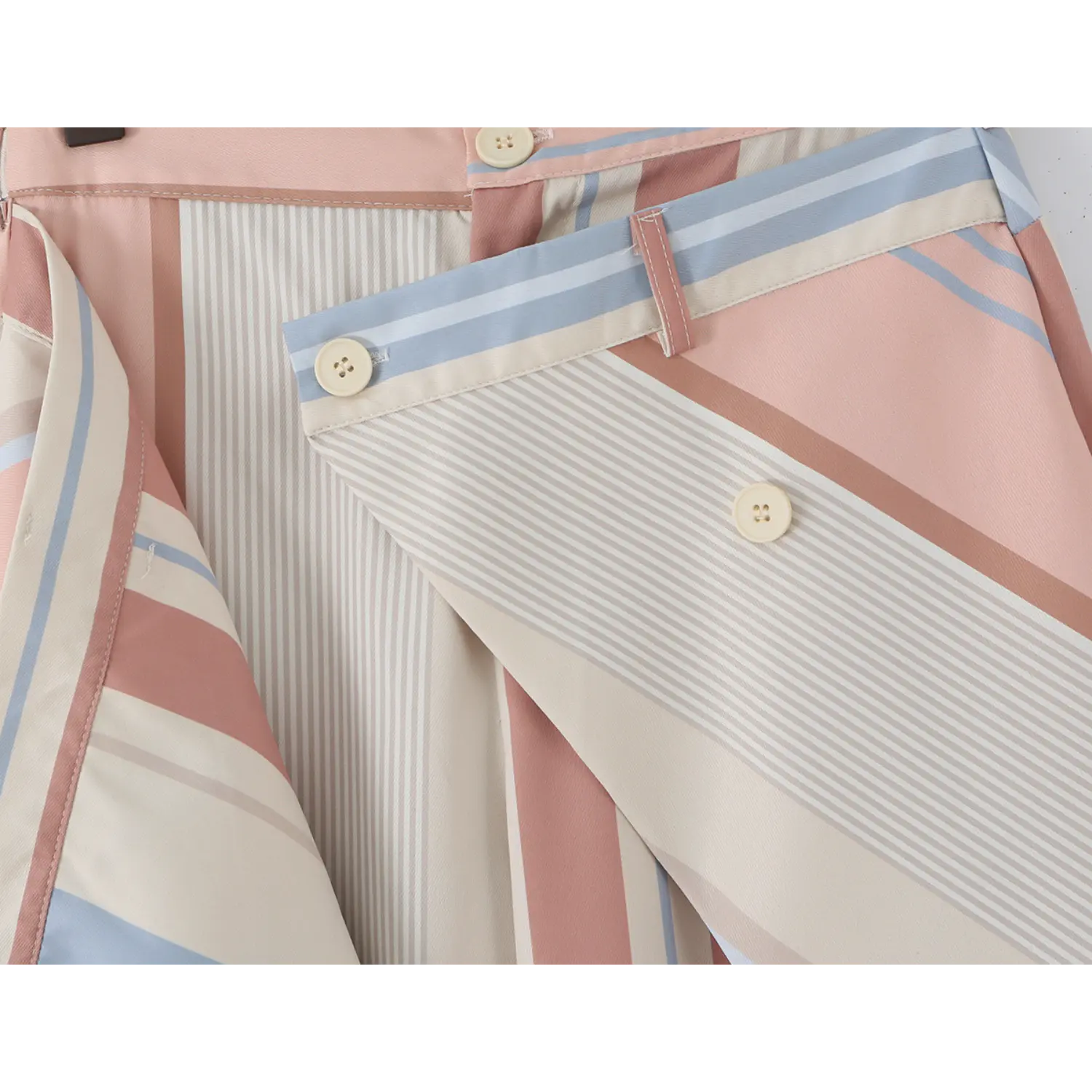 Fabric drape texture shot, lightweight matte twill woven with muted beige pink blue vertical stripe print