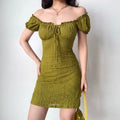 Olive green dress styled as off-the-shoulder
