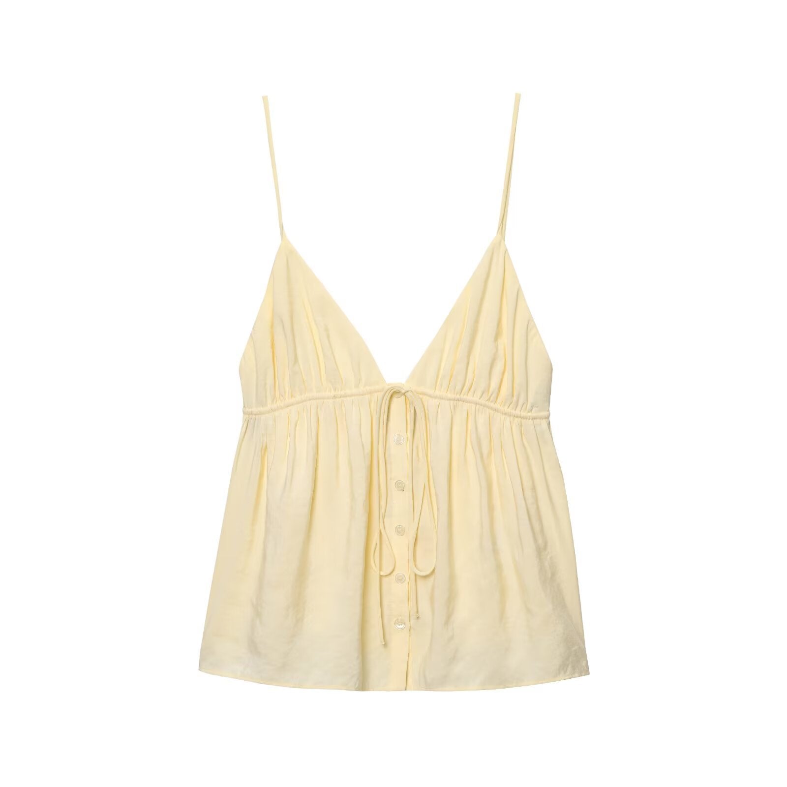 Front view of pale yellow cami top with spaghetti straps, gathered waist and button placket