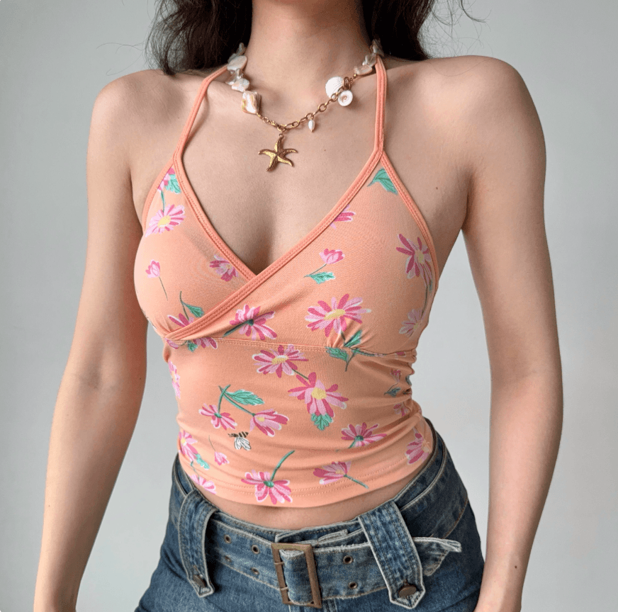 Close up front view peach orange floral halter V neck wrap ruched crop cami top, slim fitted casual vintage beach camisole