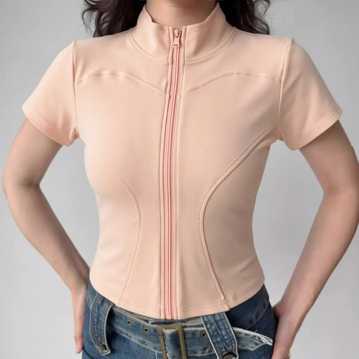 Peach color zip-up cropped t-shirt with stand collar and short sleeves