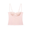 Front studio shot of pink lace corset cami