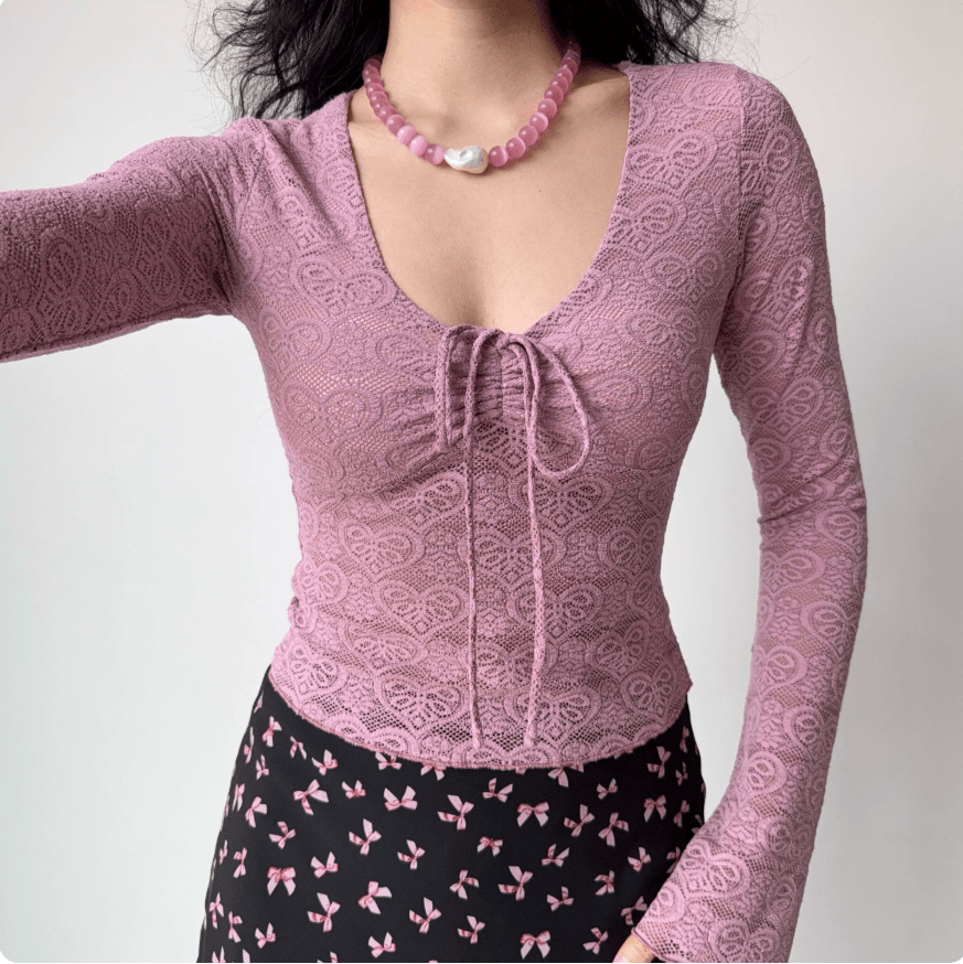 Front view pink lace floral V neck tie front ruched long sleeve crop top, hollow out see through slim elegant vintage blouse