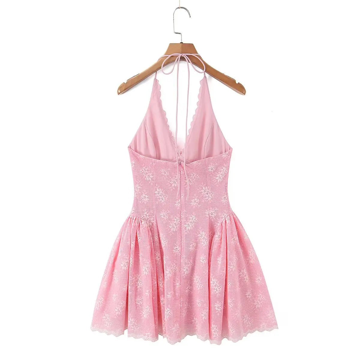 Pink lace halter mini dress, back view on white background