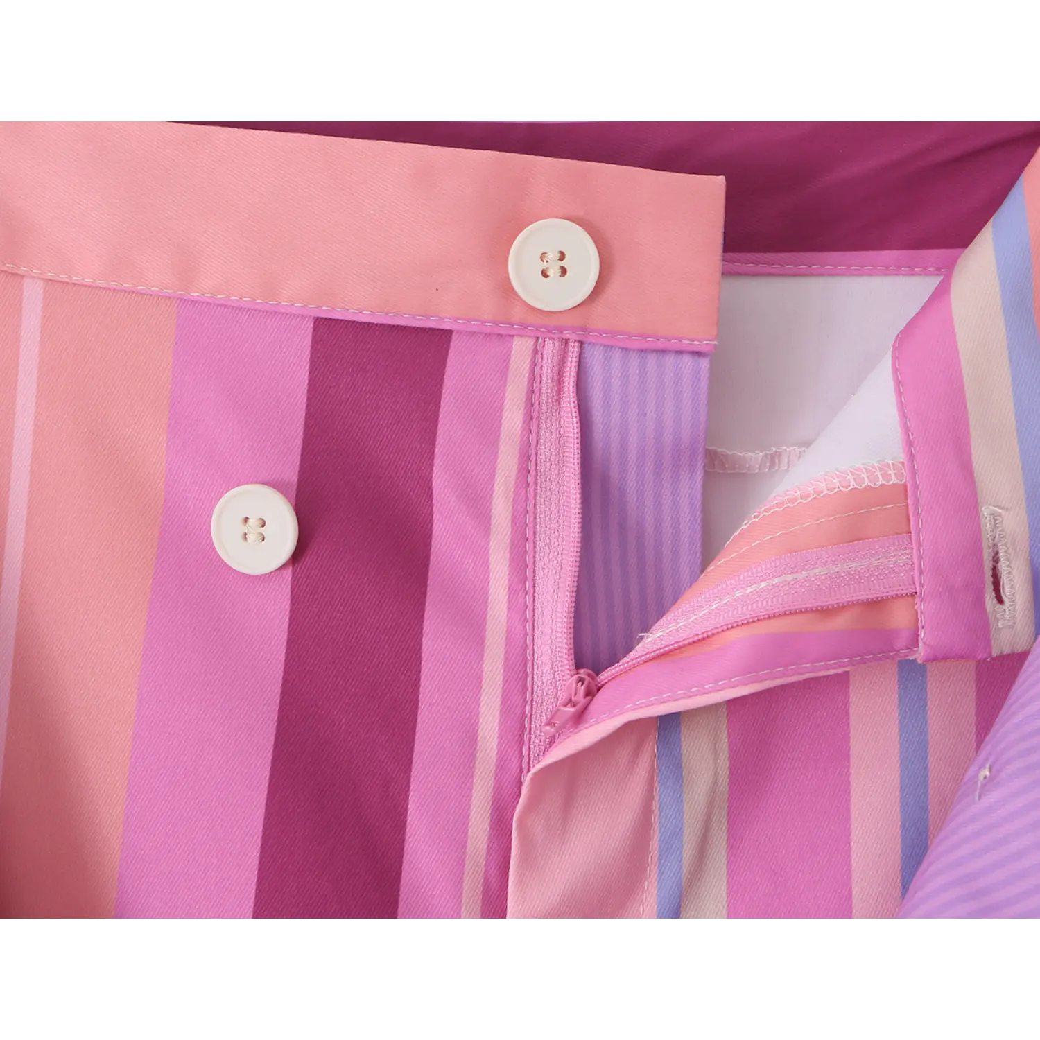 Open front fly macro shot, matching pink plastic invisible zipper, full inner lining and neat serged edge stitching