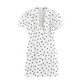 Full front view of white polka dot puff sleeve dress