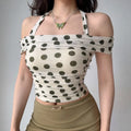 Close-up view of polka dot halter top