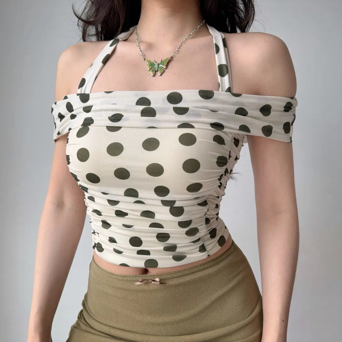 Close-up view of polka dot halter top