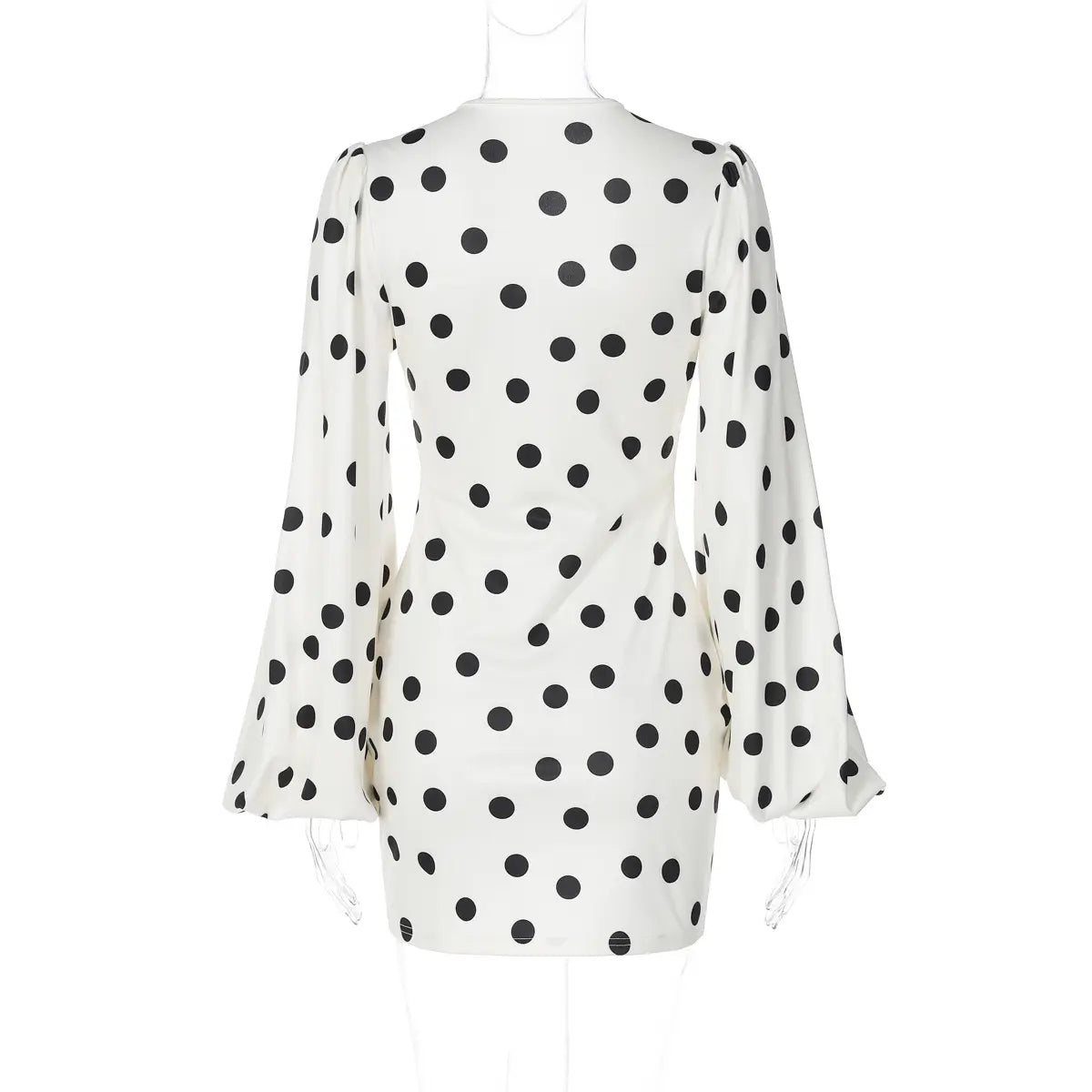 Back view of white base black polka dot long sleeve mini dress with puff sleeves
