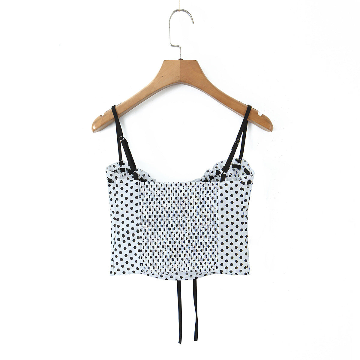 Back view women black and white polka dot pleated camisole top, smocked back design, sleeveless cropped tank with adjustable straps