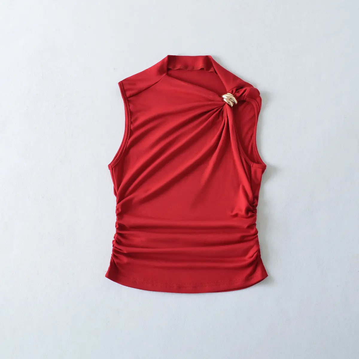 Front view of red tank top with gold metal ring and side ruching