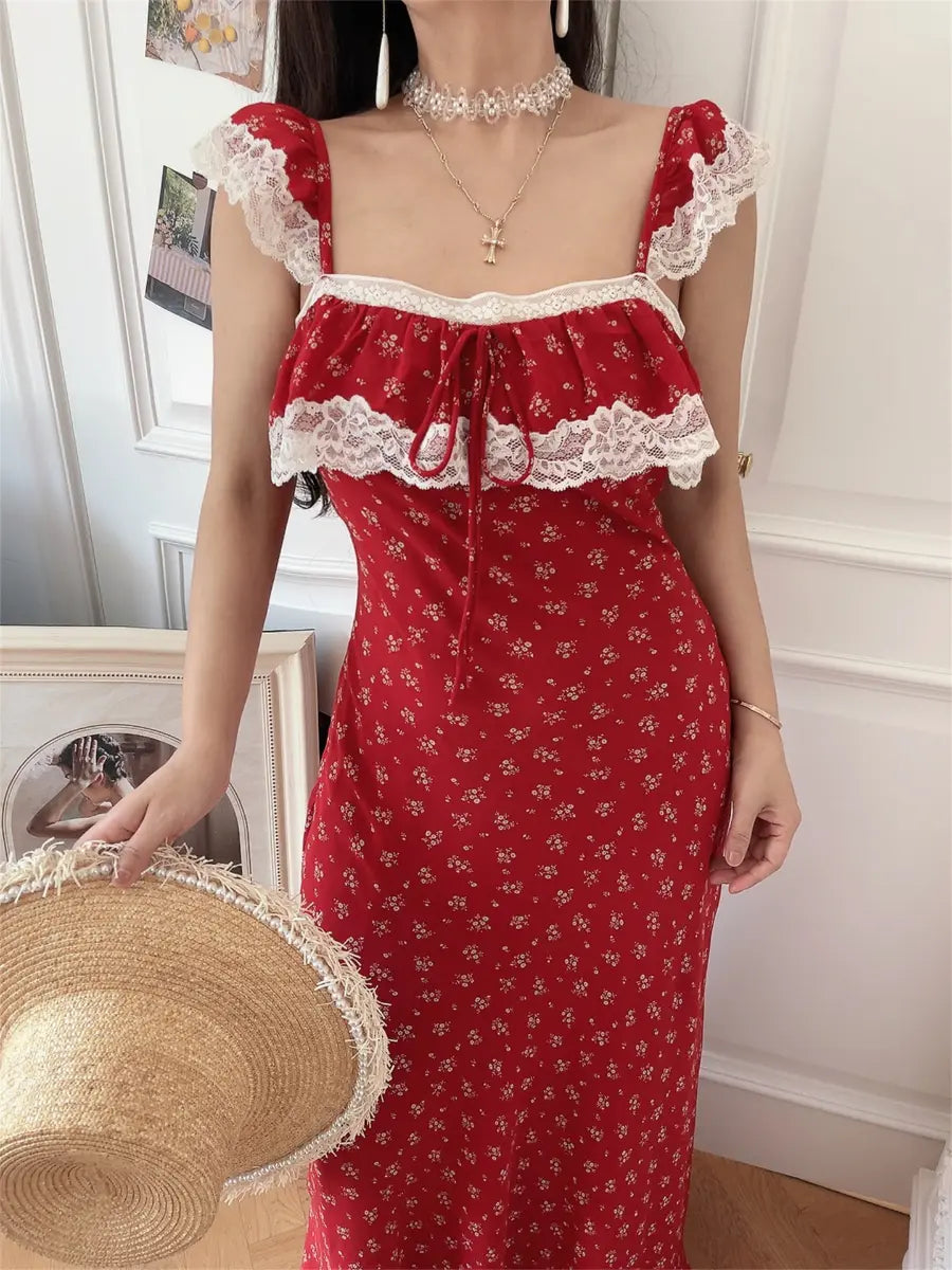 Detail view of red ditsy floral lace-trim maxi dress on model