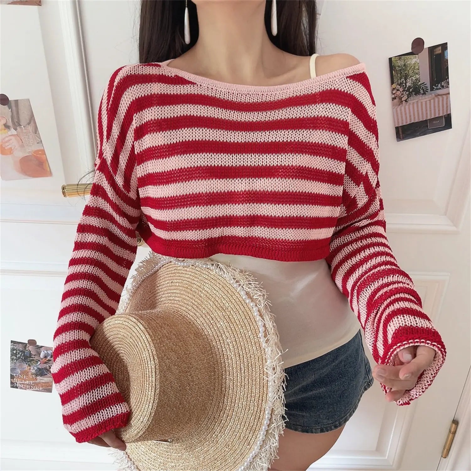 Full front shot of striped off shoulder cropped knit top, full horizontal stripe layout, loose casual fit